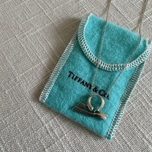 Authentic Tiffany & Co Libra Zodiac Elsa Peretti necklace pendant. 925 Sterling